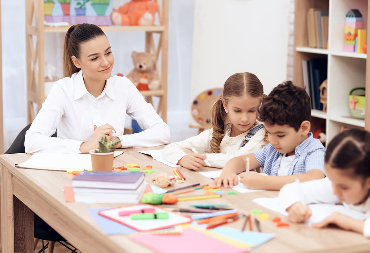 Students and educators collaborating in a district learning program